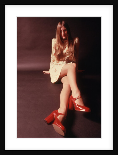 1970s Woman Long Auburn Hair Mini Skirt Dress Red Platform High Heeled Shoes by Anonymous