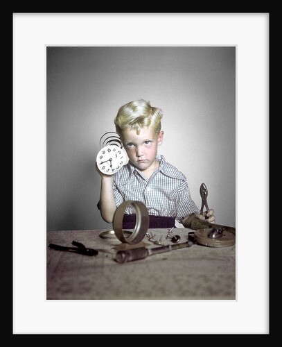 1950s Funny Curious Little Boy Holding Pliers Tool Taking Apart An Alarm Clock by Anonymous