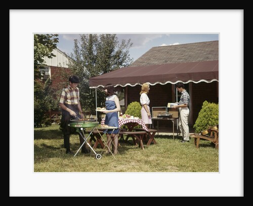 1960s Two Teenaged Couples Having Barbecue In Suburban Backyard by Anonymous