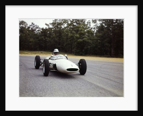 1960s Man Race Car Driver Driving Lotus Ford Sports Car by Anonymous