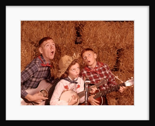 1950s 1960s Two Brothers And A Sister Playing Instruments Guitars And Banjo Singing Country Music by Anonymous
