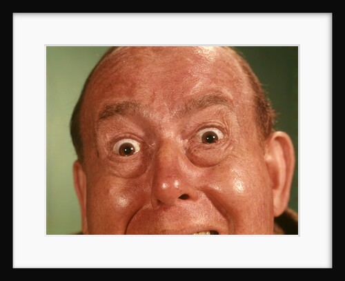 1960s Man Forehead To Chin, Silly Wacky Funny Facial Expression by Anonymous