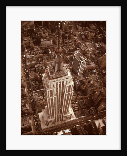 1970s Aerial Shot From Helicopter Looking Down Full Length Of Empire State Building by Anonymous