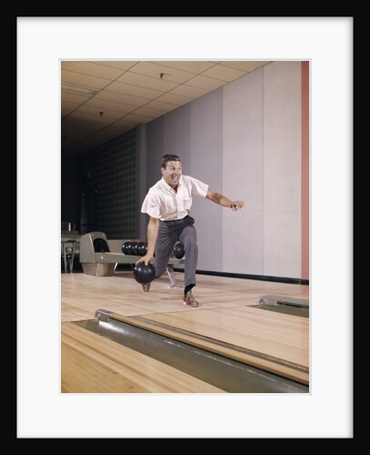 1960s Man Bowling Indoor About To Release Ball In Alley by Anonymous