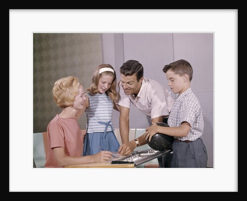 1960s Family Mother Father Daughter Son Together Bowling Looking At Score by Anonymous