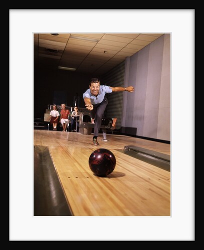 1960s Man Throwing Bowling Ball Down Alley As Family Watches In Background Fun Dad Father by Anonymous