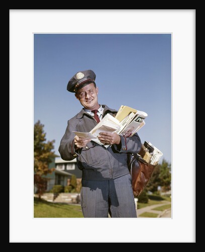 1960s Mailman Holding Letters Mail Leather Mailbag In Suburban Neighborhood by Anonymous