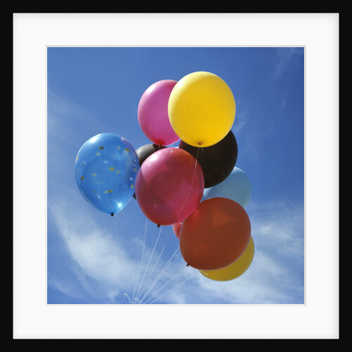 Bunch Of Multi Colored Balloons Against A Blue Sky by Anonymous