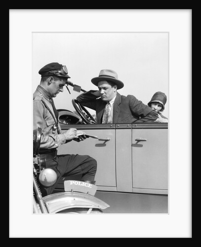 1920s Motorcycle Policeman Writing A Speeding Ticket To A Couple Sitting In Convertible Sedan by Anonymous