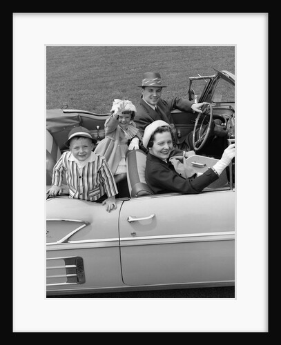 1950s Family Portrait Mother Father Son Daughter In Chevrolet Convertible Automobile by Anonymous