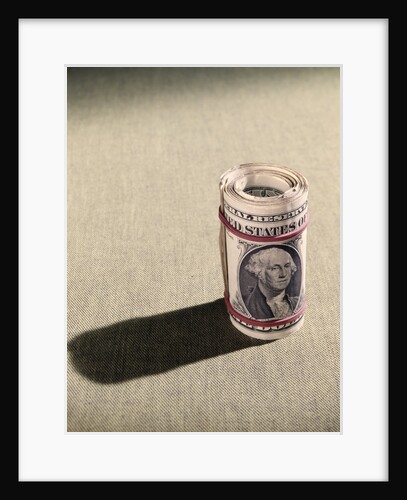 1970s Red Elastic Rubber Bands Around Roll Of One Dollar Bills by Anonymous