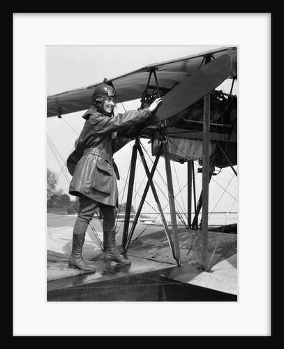1920s Woman Aviator Turning Float Biplane Propeller by Anonymous