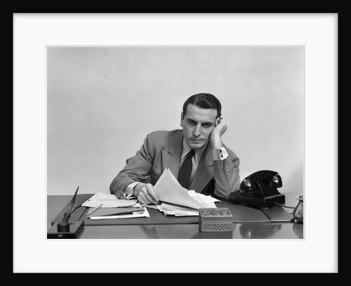 1940s Tired Overworked Man Businessman Leaning On Elbow Looking At Camera by Anonymous