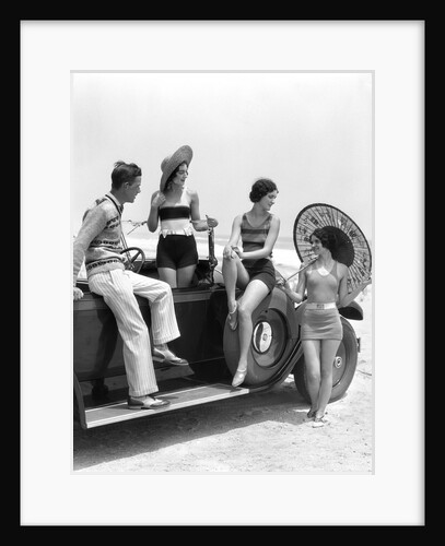 1920s 1930s Man And Three Women In Beach Clothes Or Bathing Suits Posing With Car On Running Board by Anonymous