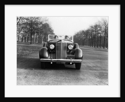 1930s 1935 Couple Driving Packard Convertible Automobile by Anonymous