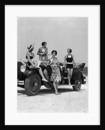 1920s 1930s Four Women In Dresses And Bathing Suits Gathered Around Convertible Touring Car At Seashore by Anonymous