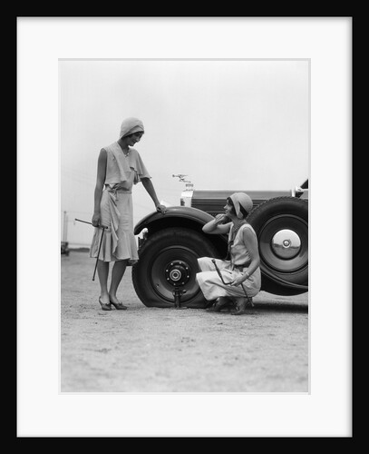 1930s Two Women Confront An Automobile Flat Tire by Anonymous