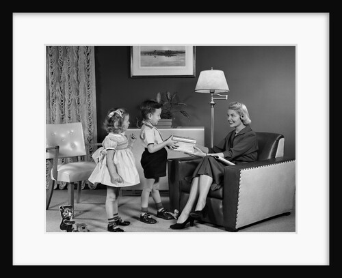 1950s Little Boy And Girl Son And Daughter Giving Woman Mother Sitting In Living Room A Gift Present by Anonymous
