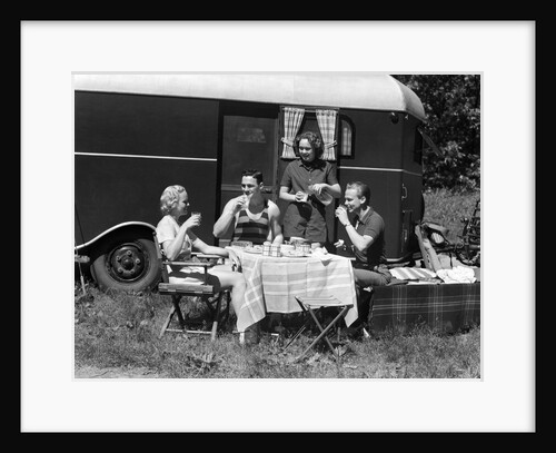 1930s Two Couples Eating Picnic Lunch Beside Camping Trailer by Anonymous