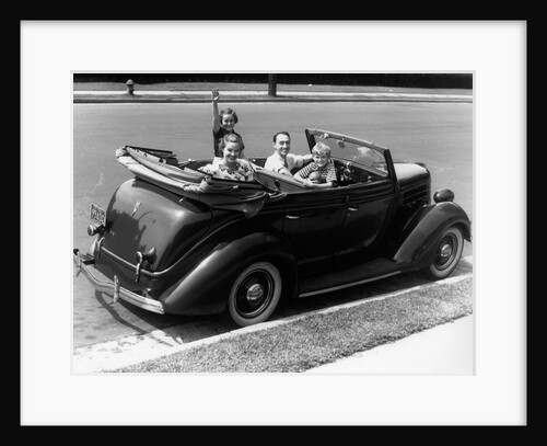 1940s Family Of Four In Convertible Ford V-8 Sedan At Camera by Anonymous