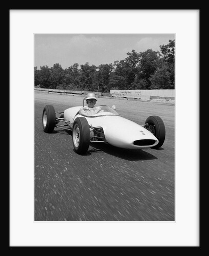 1960s Lotus Ford Race Car Speeding Around Track by Anonymous