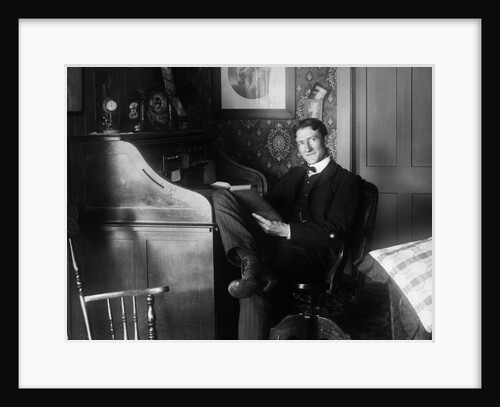 1890s 1900s Man Sitting At Desk Reading Book by Anonymous