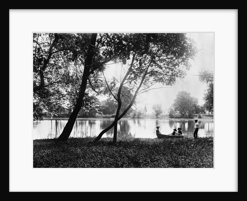 1890s 1900 Older Brother Watching Three Younger Children In Rowboat On Small Lake by Anonymous