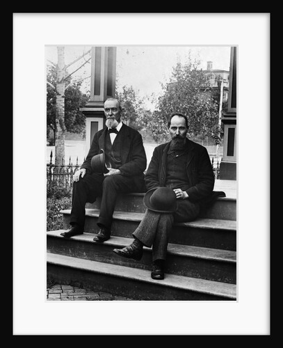 1890s 1900 Two Bearded Men In Suits Holding Bowler Hats Sitting On Stairs In Front Of House by Anonymous