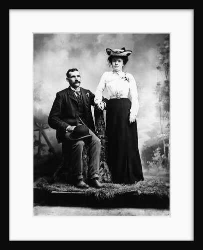 1890s 1900 Portrait Serious Couple Holding Hands Together In Rustic Studio Setting by Anonymous