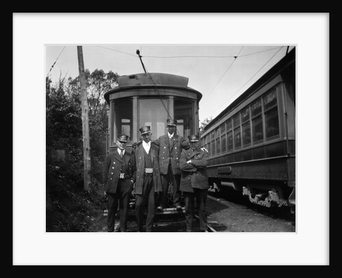 1900s Conductors Posing In Front Of Trolley Car by Anonymous