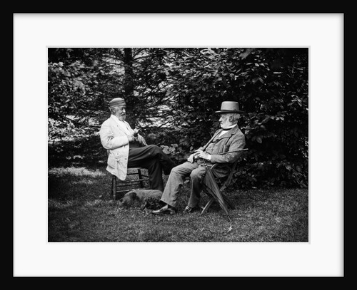 1900 Two Men Sitting Outside In Chairs Among Trees Smoking Cigars Talking Dog Laying At Their Feet by Anonymous