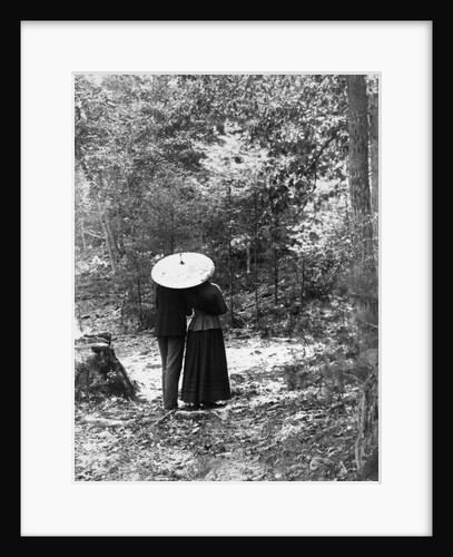 1900 View Of Back Of Couple Walking Through Woods Under Umbrella Man With Arm Around Woman by Anonymous