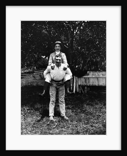 1900 Man Smoking Cigar Carrying Wife Piggyback by Anonymous