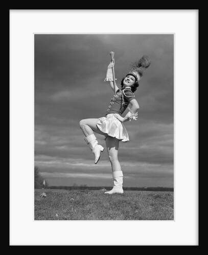 1940s Woman Drum Major In Majorette Band Uniform Twirling Baton by Anonymous