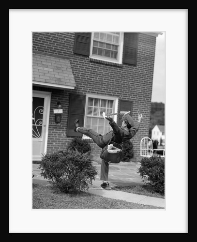 1950s Man Mailman Tripping Falling In Front Of A Suburban Brick House Accident by Anonymous