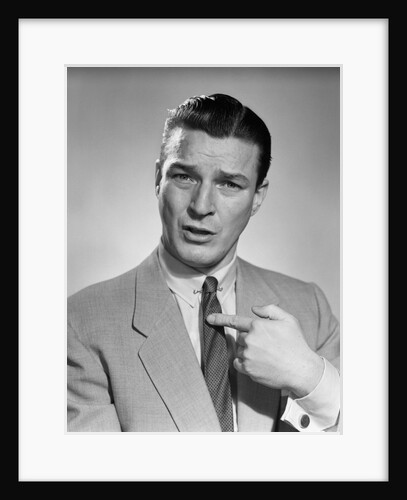 1950s Businessman Serious Expression Pointing To His Chest Confused by Anonymous