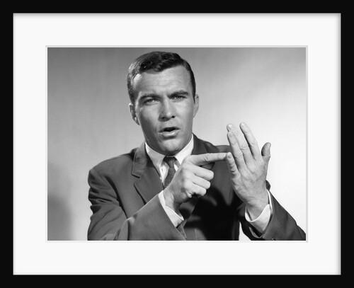 1950s Earnest Salesman Talking Gesturing With Hands by Anonymous