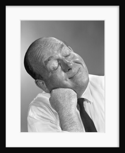 1950s 1960s Balding Man Leaning Head On Fist In Shirt And Tie Eyes Closed Thinking Expression by Anonymous