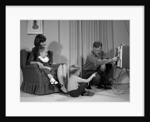 1960s Family Mother Father Son Daughter Watching Television In Living Room Indoor by Anonymous