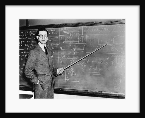 1930s Man Teacher Looking At Camera With Pointer At Blackboard by Anonymous