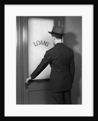 1930s 1940s Man In Suit And Hat Opening Door Marked Loans by Anonymous