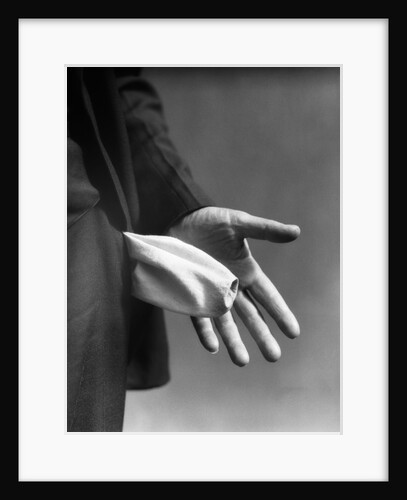 1930s Man's Hand Turning Empty Pants Pocket Inside Out by Anonymous
