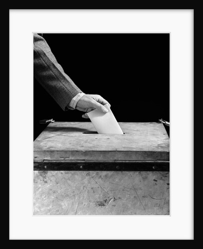 1930s 1940s Man's Hand Putting Ballot In Slot In Box by Anonymous
