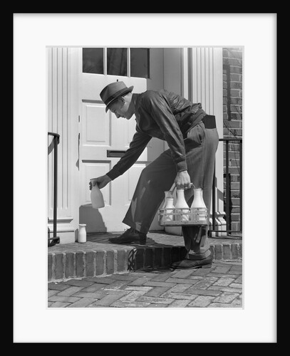 1940s Milkman Setting Glass Bottles Of Milk And Cream In Front Of Door by Anonymous