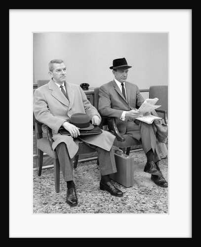 1950s 1960s Two Men Businessman Salesman Sitting In Office Reception Waiting Area Indoor by Anonymous