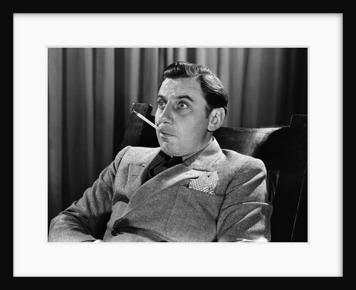 1930s Bug-Eyed Man With Thermometer In Mouth by Anonymous