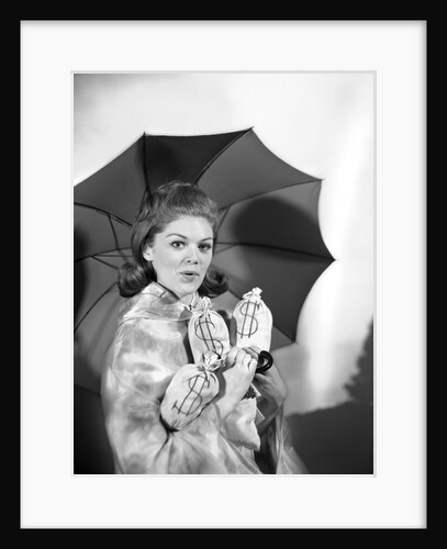 1960s Woman With Umbrella Holding Bags Of Money Save Your Money For A Rainy Day by Anonymous