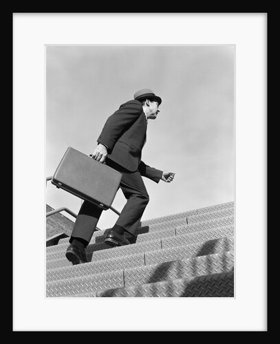 1960s Salesman Briefcase In Hand Climbing Steep Hard Steel Tread Stairs by Anonymous