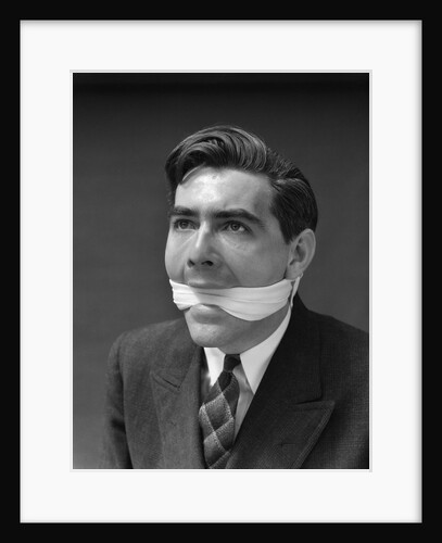 1930s Portrait Of Man With Gag In Mouth by Anonymous