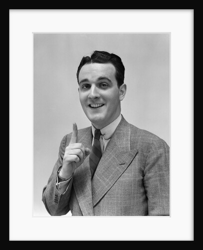 1940s Man In Suit Holding Up Index Finger Making A Point by Anonymous